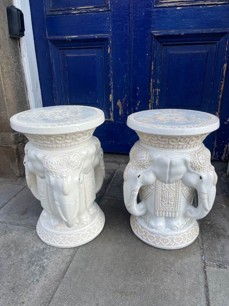  White ceramic garden stools are Chinese porcelain pieces featuring elephants 