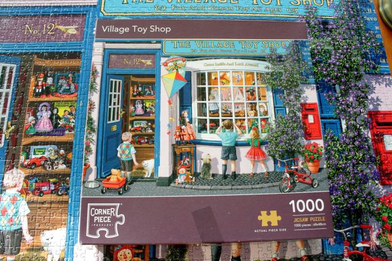 Corner Piece, VILLAGE Toy Shop 1000 Piece Jigsaw Puzzle,size 68 x 48cm. Can be posted