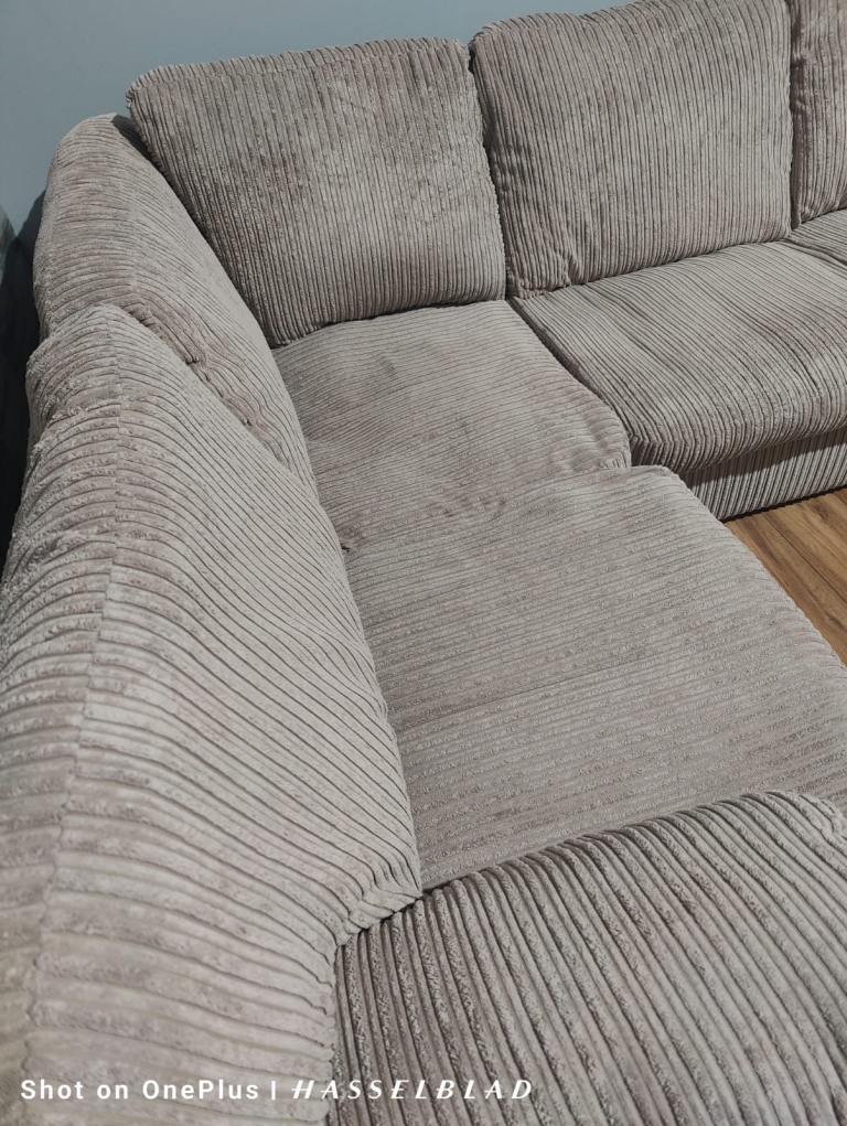 Large beige DFS Corner Sofa Bed  with footstool + free delivery