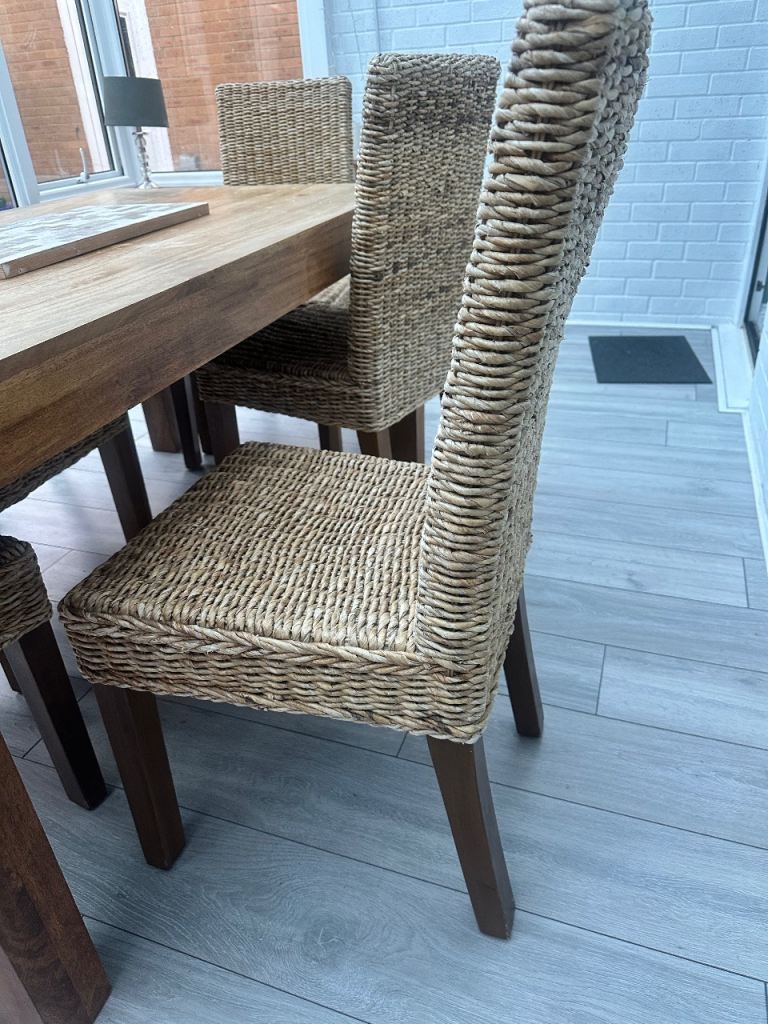 Mango wood tanle and six rattan chairs
