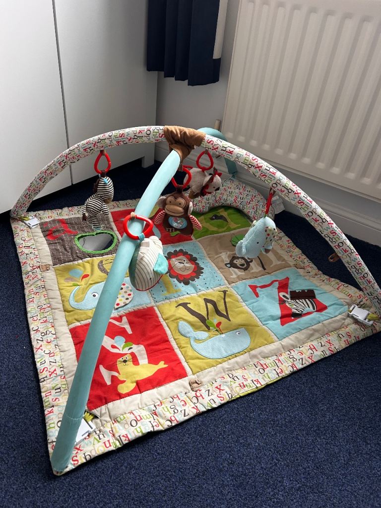 Skip hop play mat and fisher price tummy time llama 