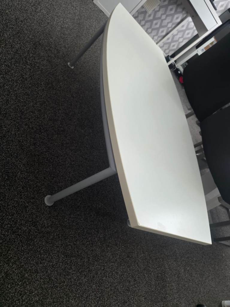 White shaped table