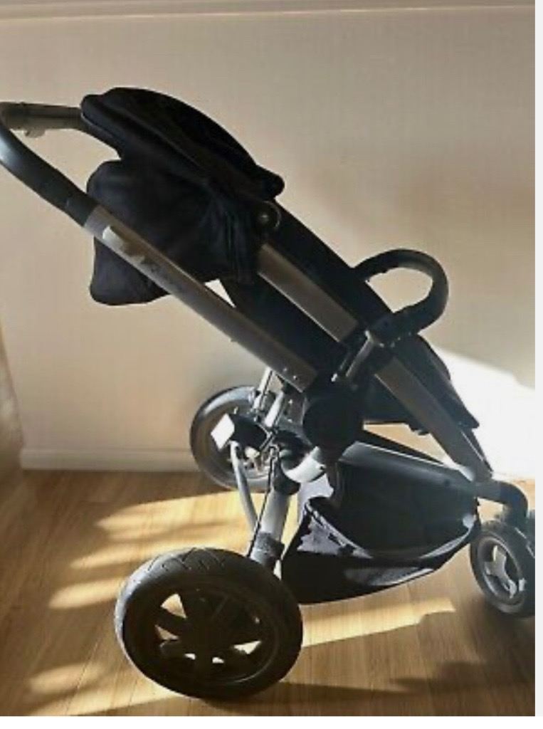 Quinny black extra stroller push chair for sale. Bristol