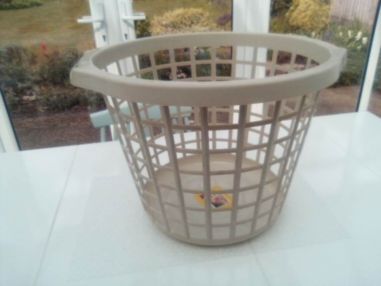 As new plastic washing basket.