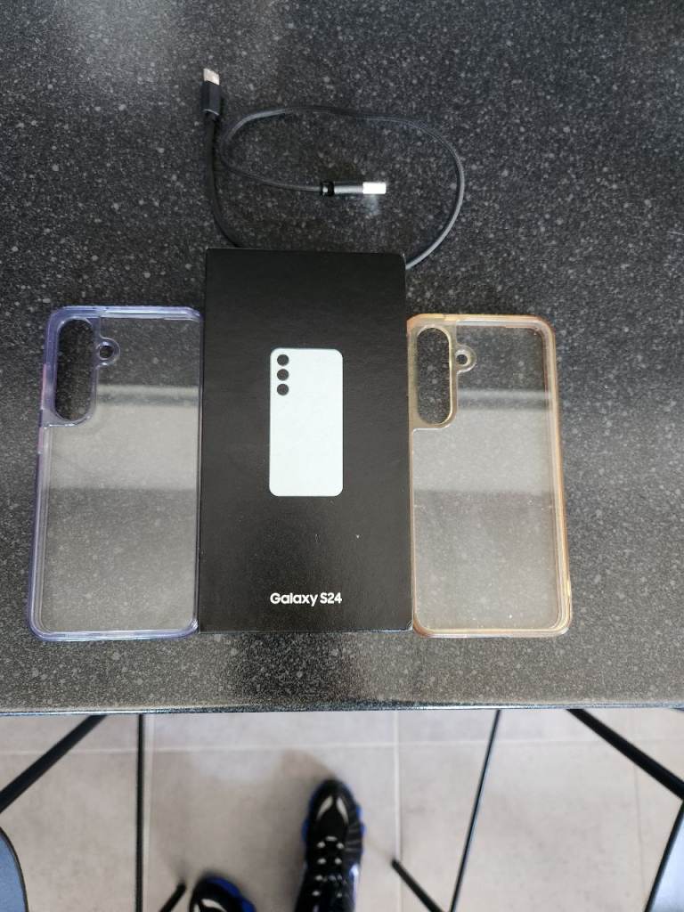 Samsung Galaxy S24 with Two Cases and Cable – As Good As New