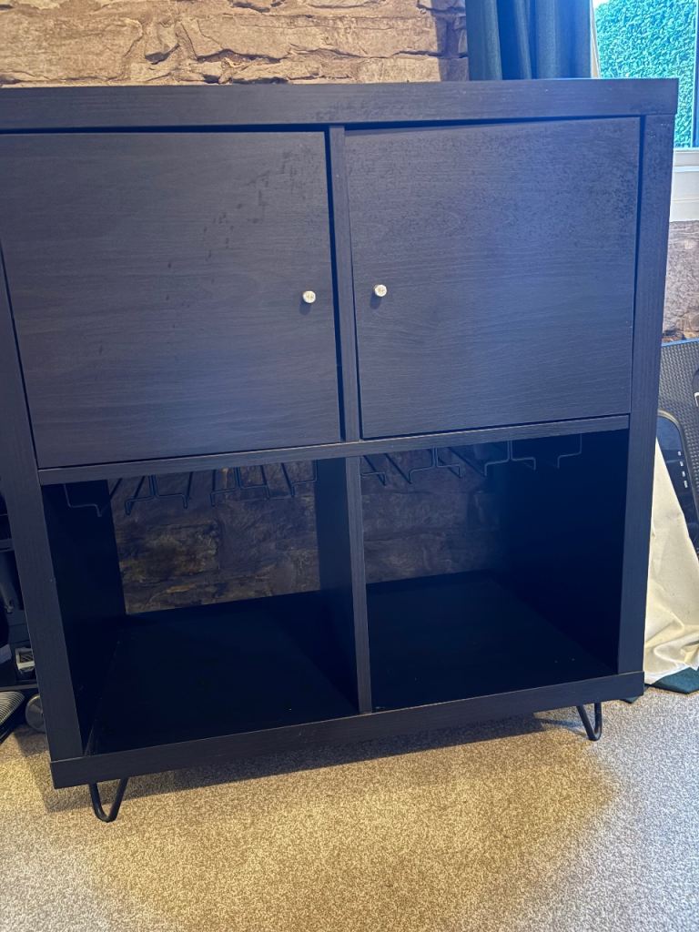 Black IKEA Kallax, with hairpin legs and wine glass holder
