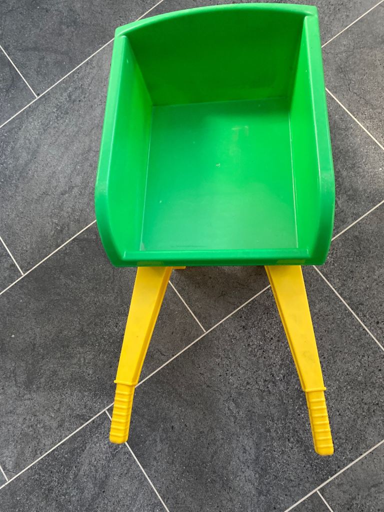 Child’s plastic wheelbarrow