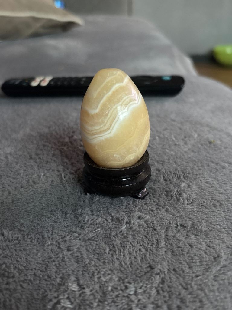 Decorative Beige Stone Egg on Stand – Good Condition