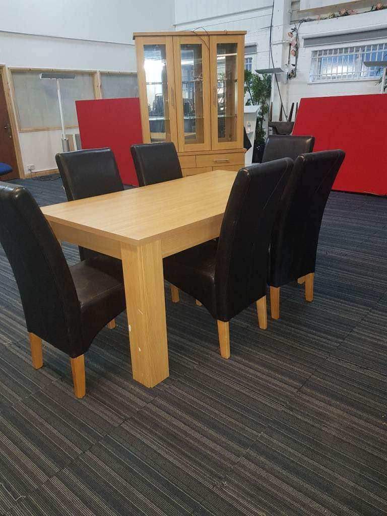 Oak Dining Table with 6 Black Faux Leather Chairs
