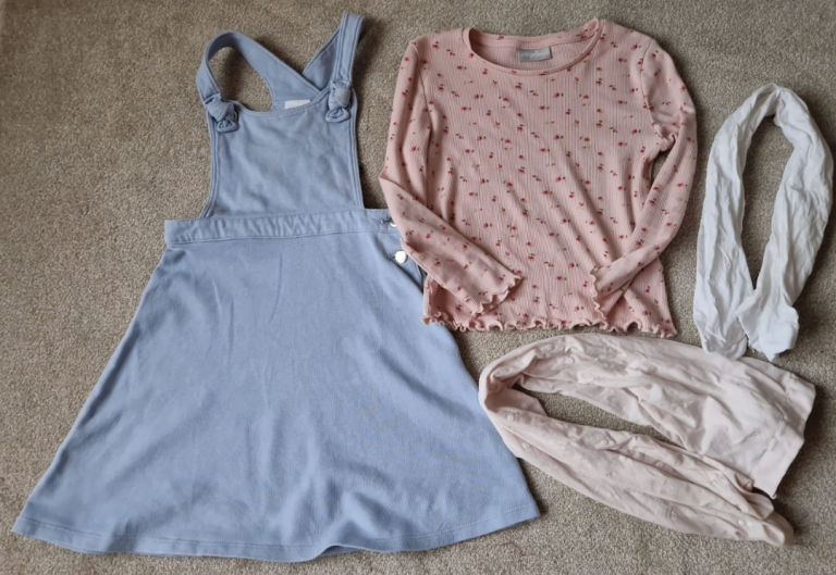 girls blue cotton dungaree dress with pink tfloral top and nylon tights age 5-6