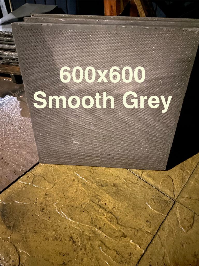 600X600 grey council patio slabs 