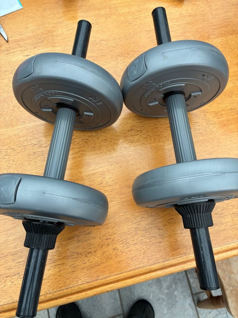 Two hand held dumb bells