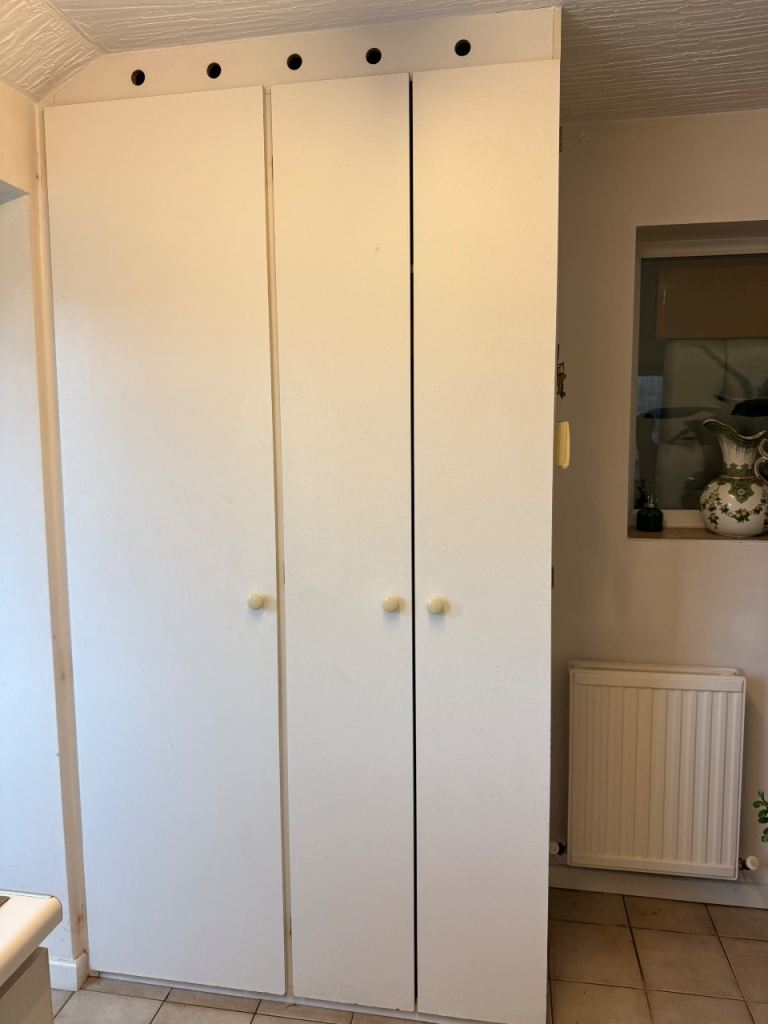 Fitted 3 door cupboard 225cm high