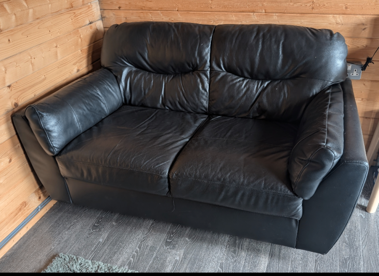 Small black leather sofa 