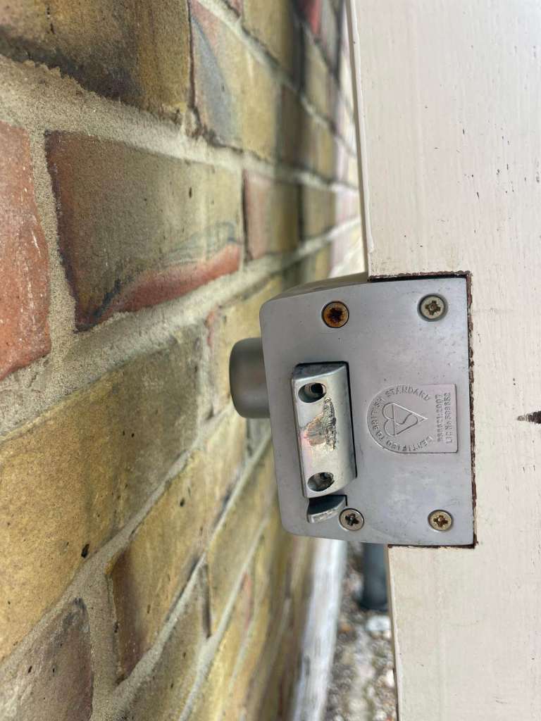 Double glazed front solid door white with locks, handle and hinges.