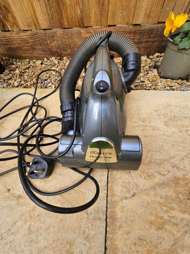 Portable vacuum cleaner Home-tek Hunter HT807 (handheld, turbo brush)