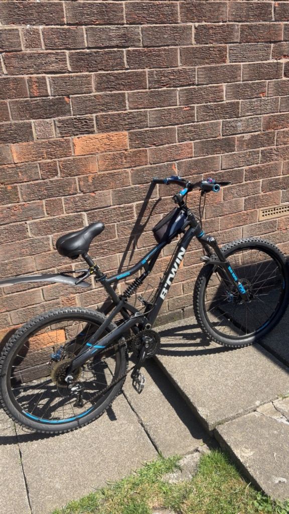 BTWIN Mountain Bike – Black with Blue Accents, Good Condition