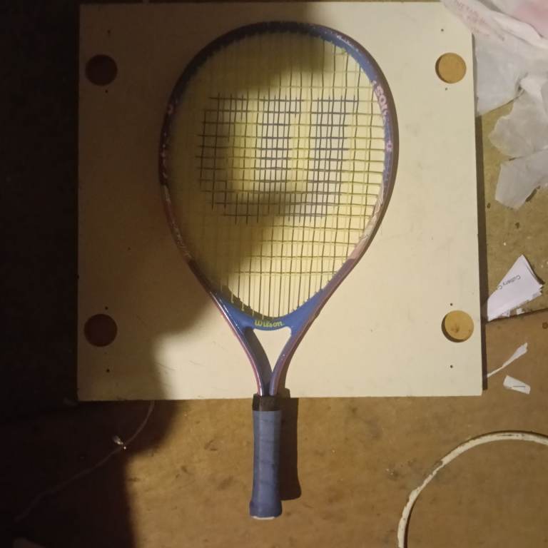 Wilson purple tennis racket