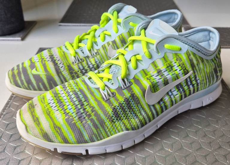 Nike Free 5.0 TR Fit 4 Print running shoes in a green, yellow, and grey colorway. UK Size 4