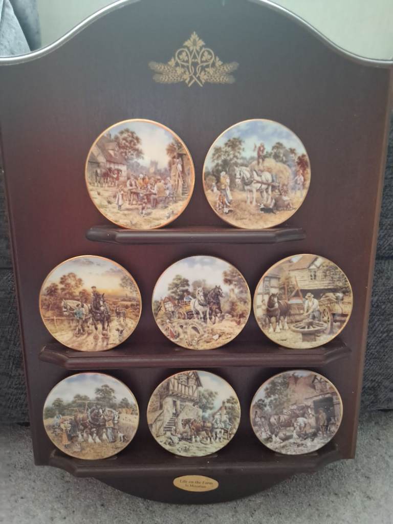 A Set Of 8 Life On The Farm In Miniature Collectable Plates Complete With Display Stand.