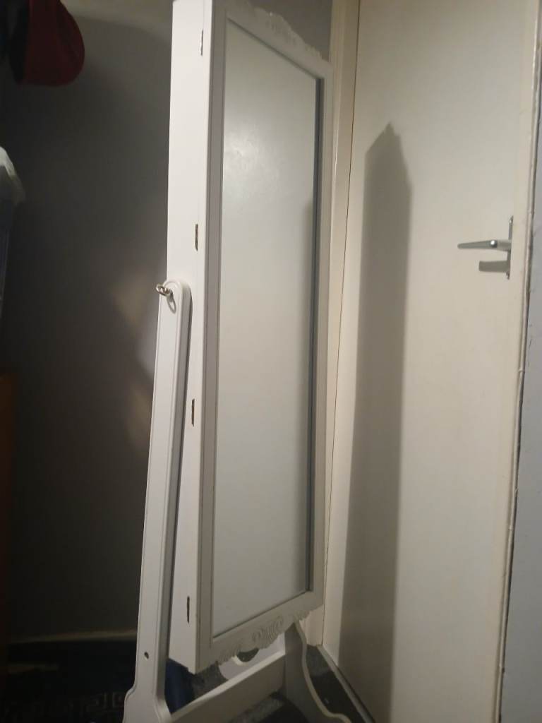 Mirror free standing jewelry cabinet