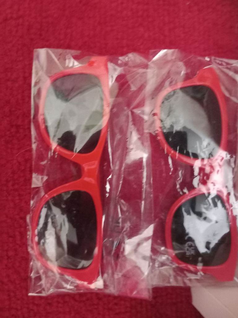 Kids sunglasses x 2.  Buyer to collect.