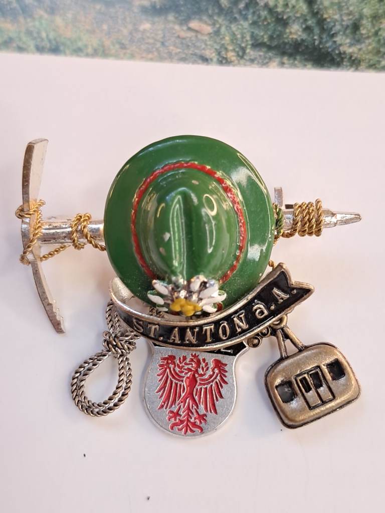 Collectible  A souvenir brooch related to St. Anton am Arlberg, a famous ski resort in Austria.
