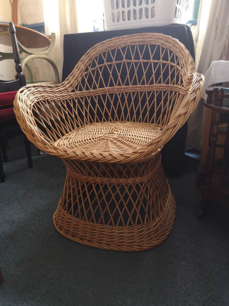 a lovely canework tub chair