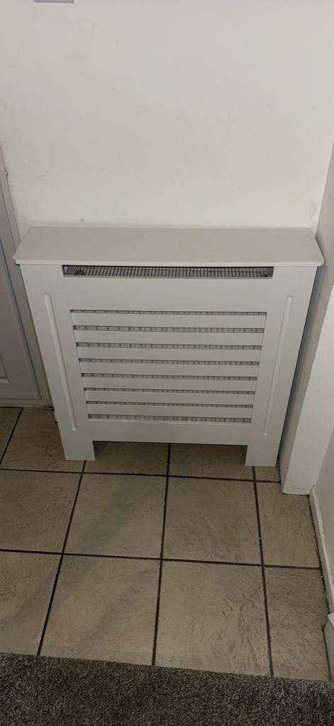 White vertical radiator cover 