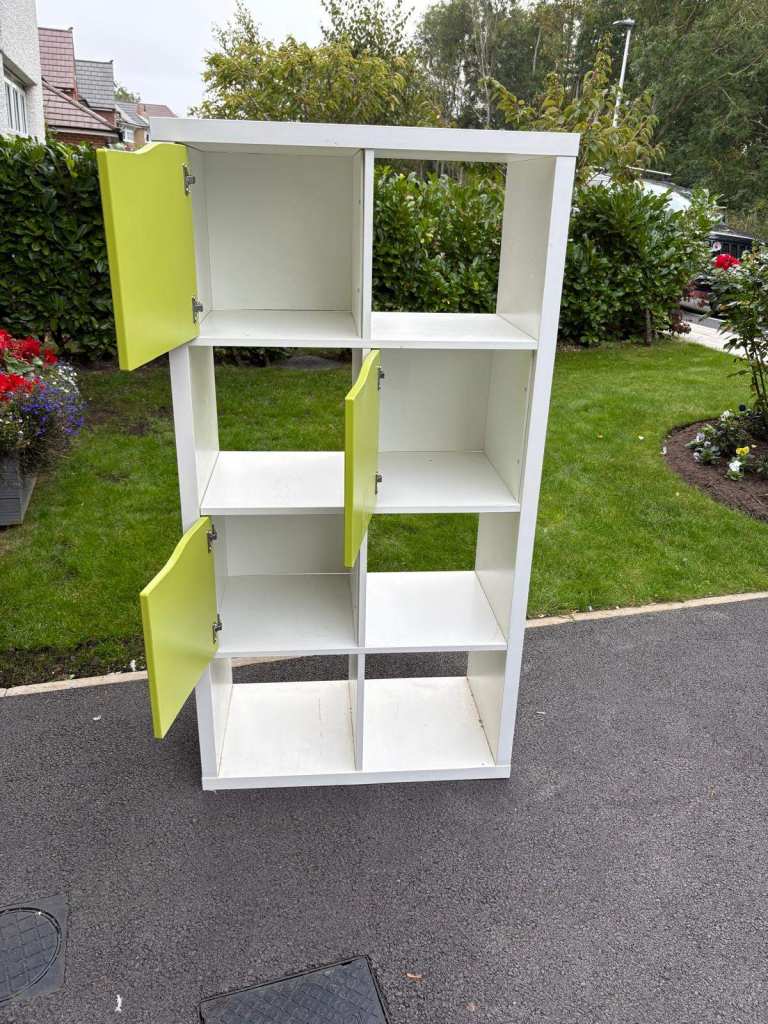 White Storage Unit with Green Doors – Good Condition