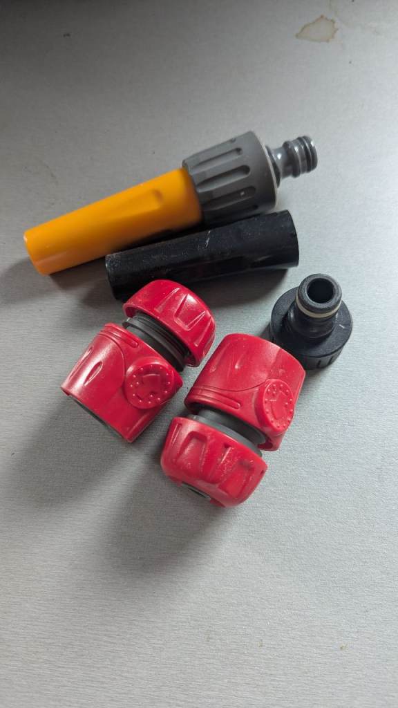 Assorted Garden Hose Attachments – Good Condition
