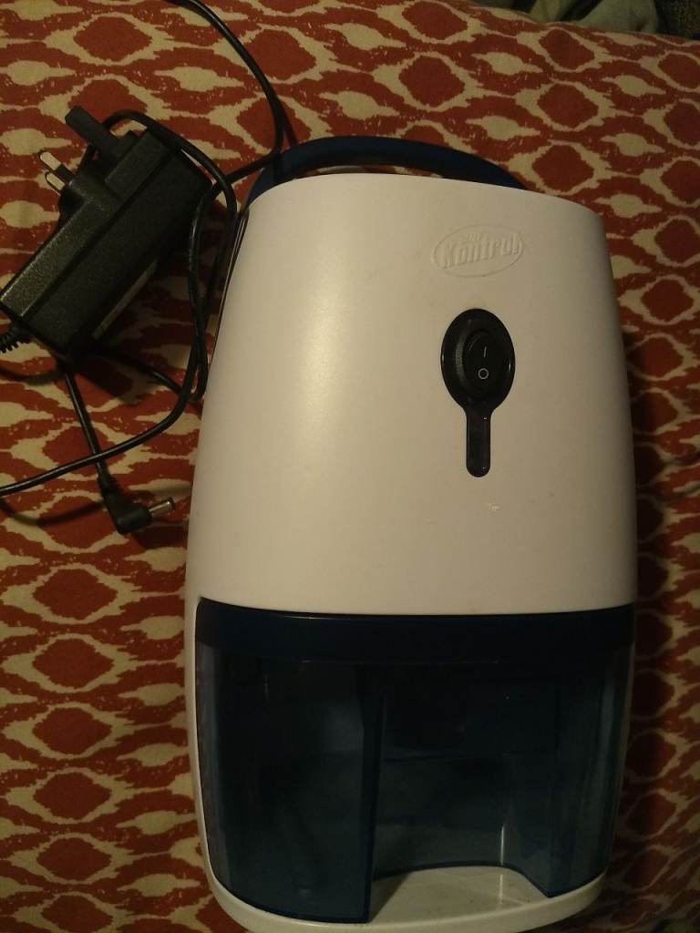 Damp kontrol mini electric dehumidifier
