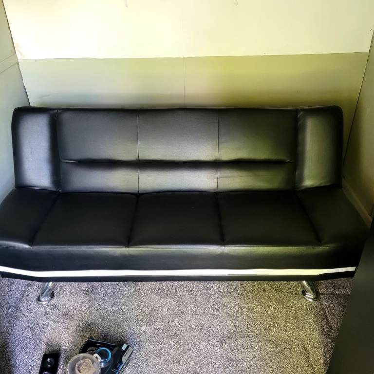 Black leather sofa bed