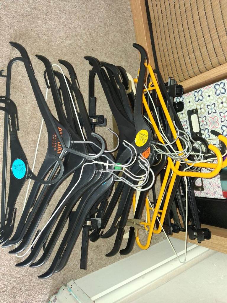 FREE 30 ladies plastic coathangers