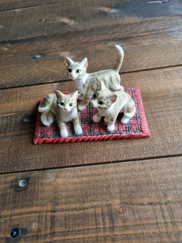 Collectable cat ornament figures.