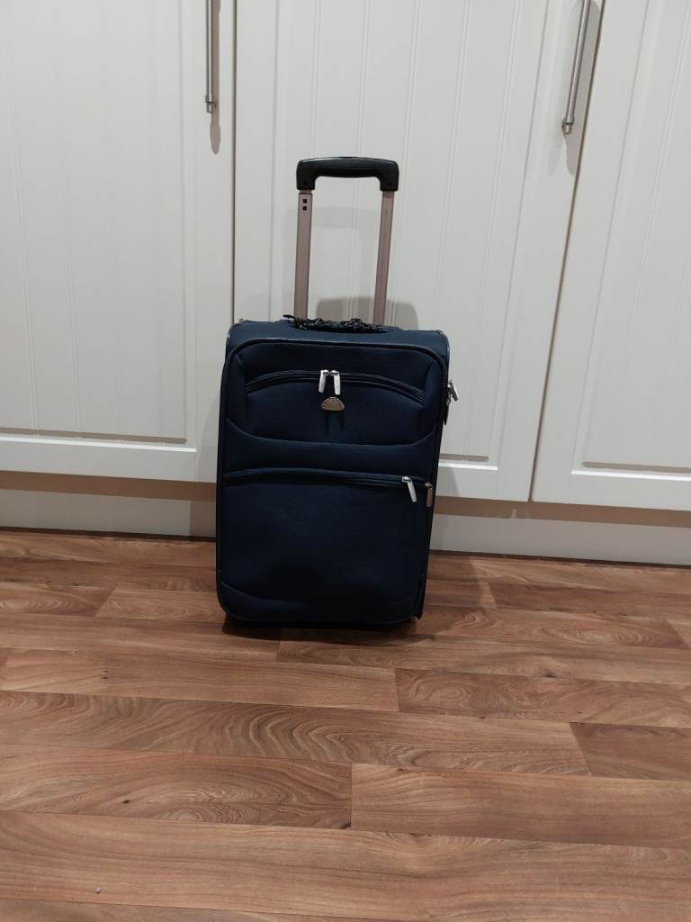 top quality expensive (RRP £40)small blue suitcase seldom used in very good condition 50x34x20cms