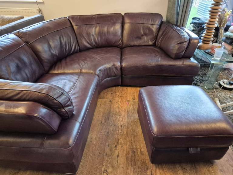 L- Shaped settee with 3 seater and poufffe