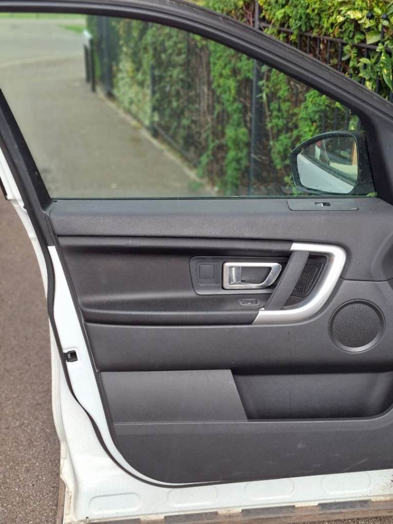 Genuine Land Rover Discovery Sport front interior door card/panel for sale.