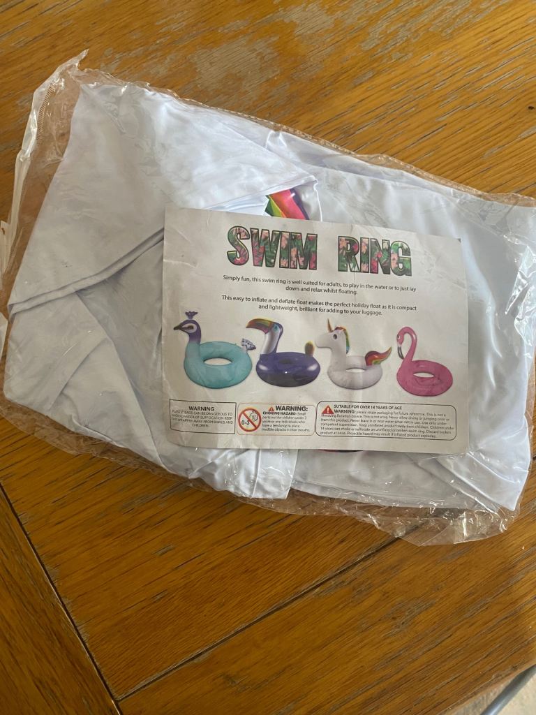 image for New (in packaging) blow up Unicorn swimming ring 