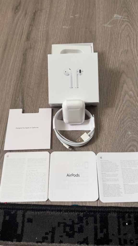 Apple AirPods with Wireless Charging Case – New
