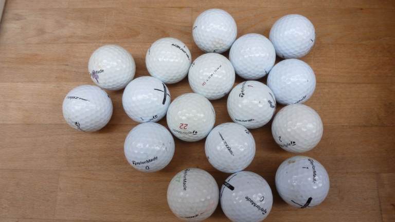 USED TAYLORMADE GOLF BALLS, PRICE IS FOR A DOZEN COLLECTION B79 7US, THANKYOU