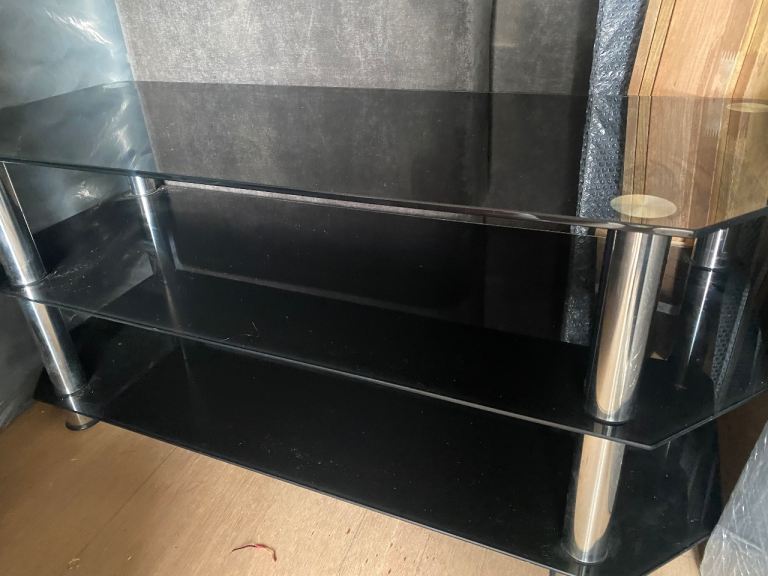 Black Glass TV Stand with Chrome Legs – Good Condition