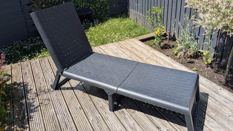 Folding rattan effect sun lounger