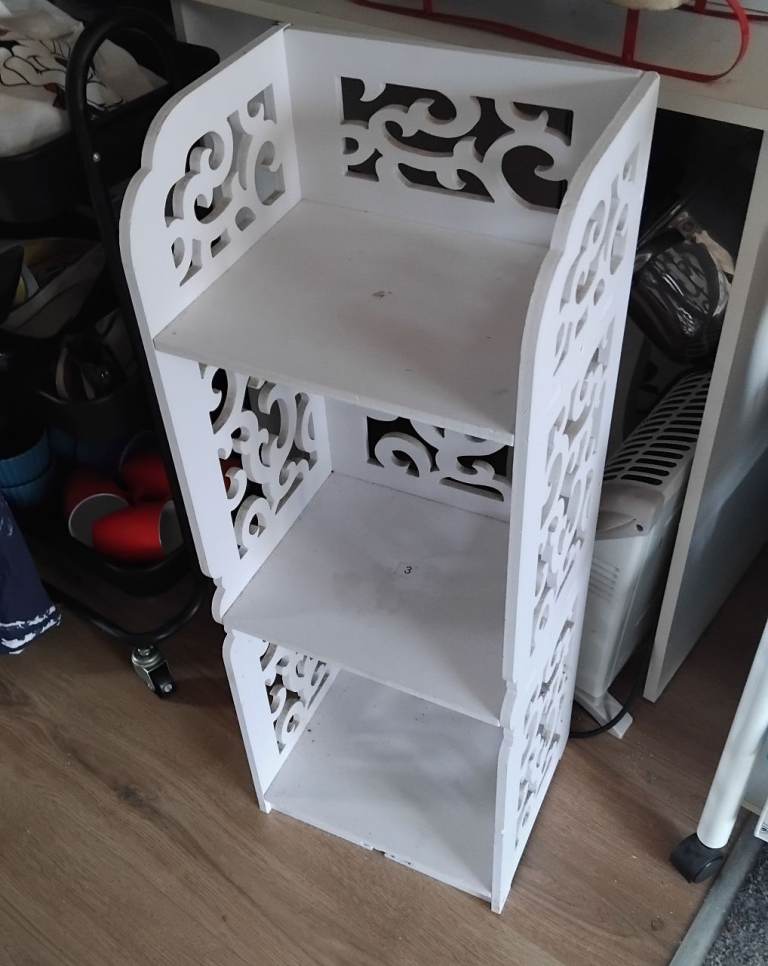 White Wooden Storage Shelf Unit with Decorative Cut-outs