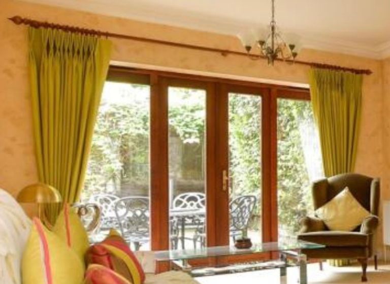 2 Pairs of Green Pinch Pleat Curtains