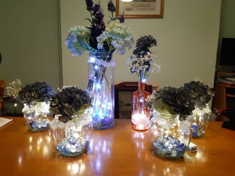 Decorative glass bowls and bottle and vase.