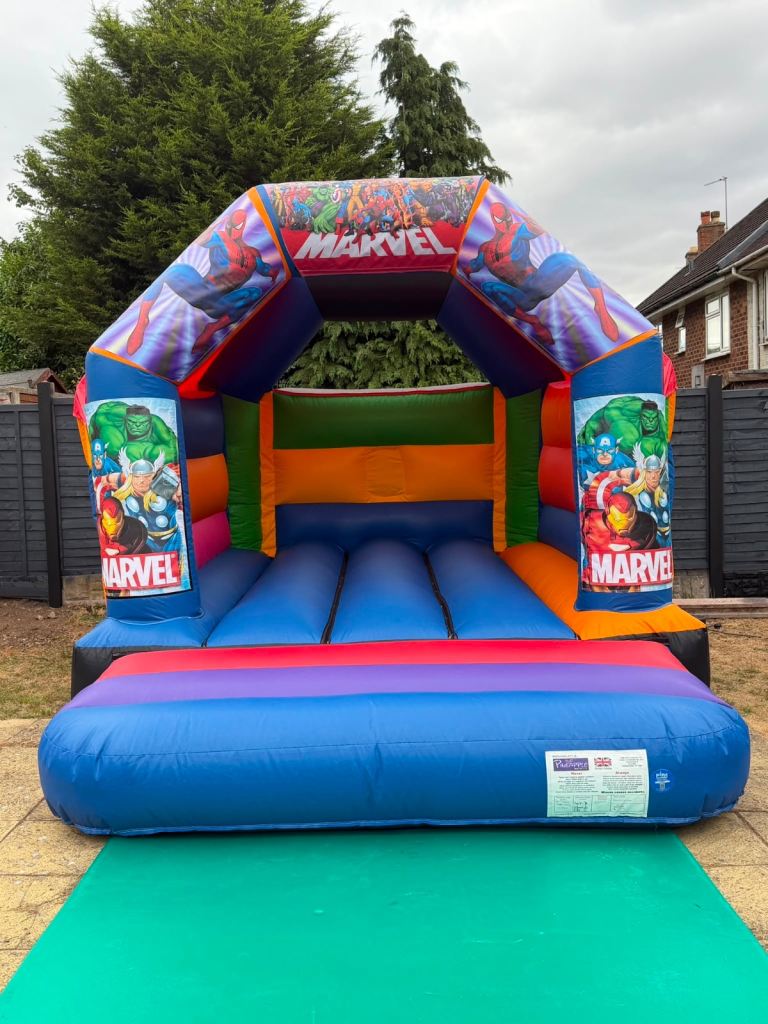 Bouncy castle Hire 11ft x 15ft Marvel Spiderman Bouncy Castle Just £100! 