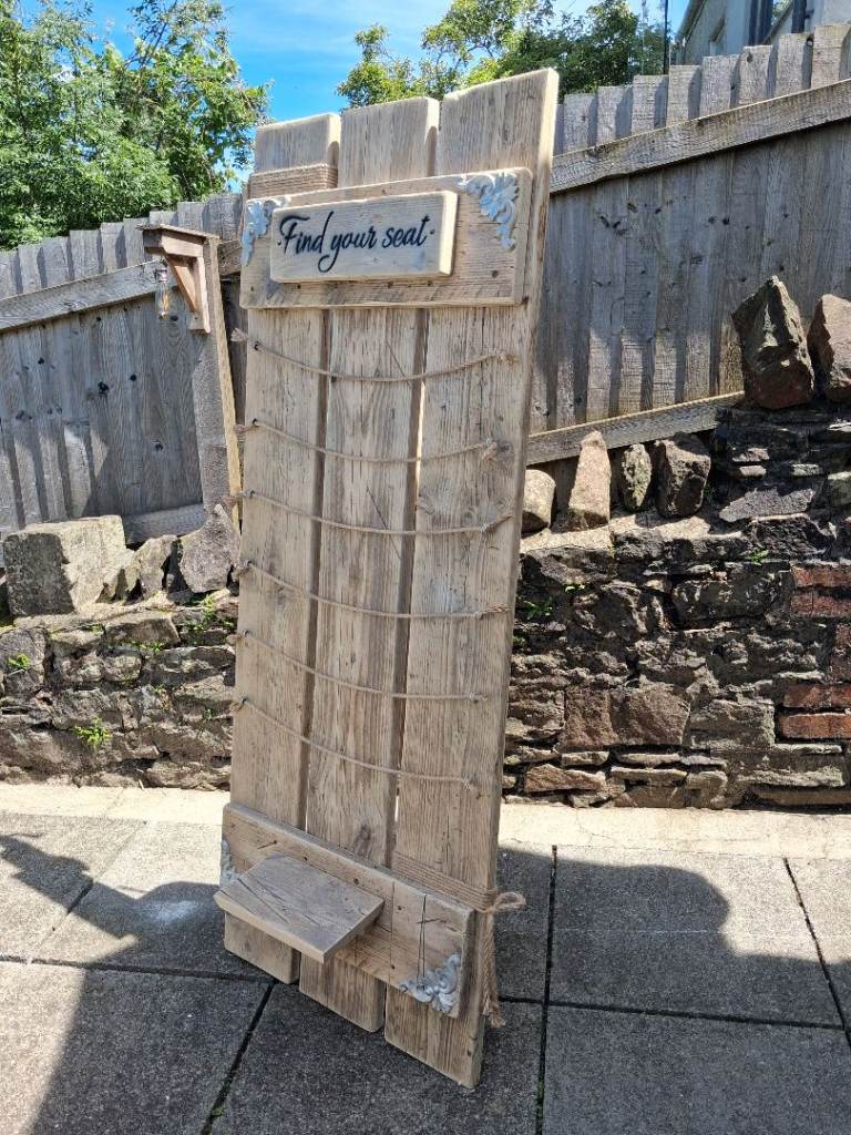 Wedding seating plan board from reclaimed timbers 