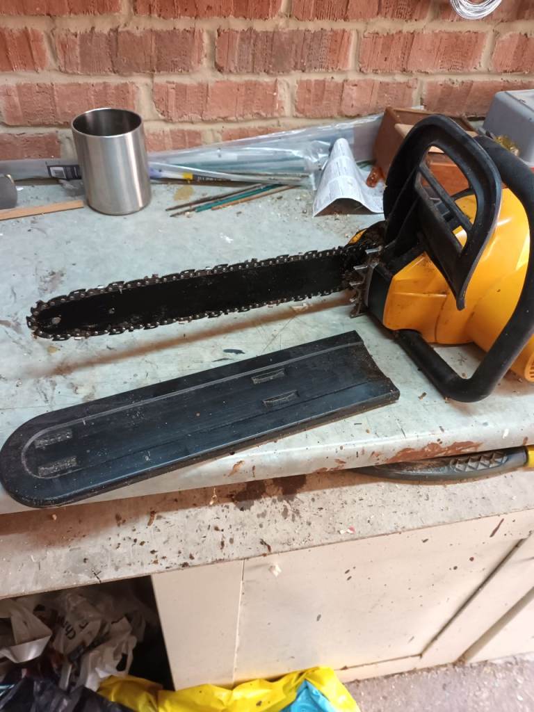 Chain saw . Mains powered.  