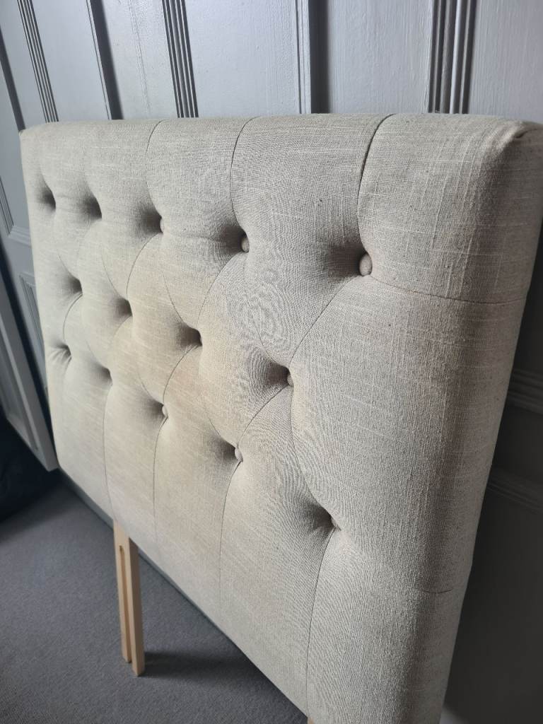 Single bed upholstered head board